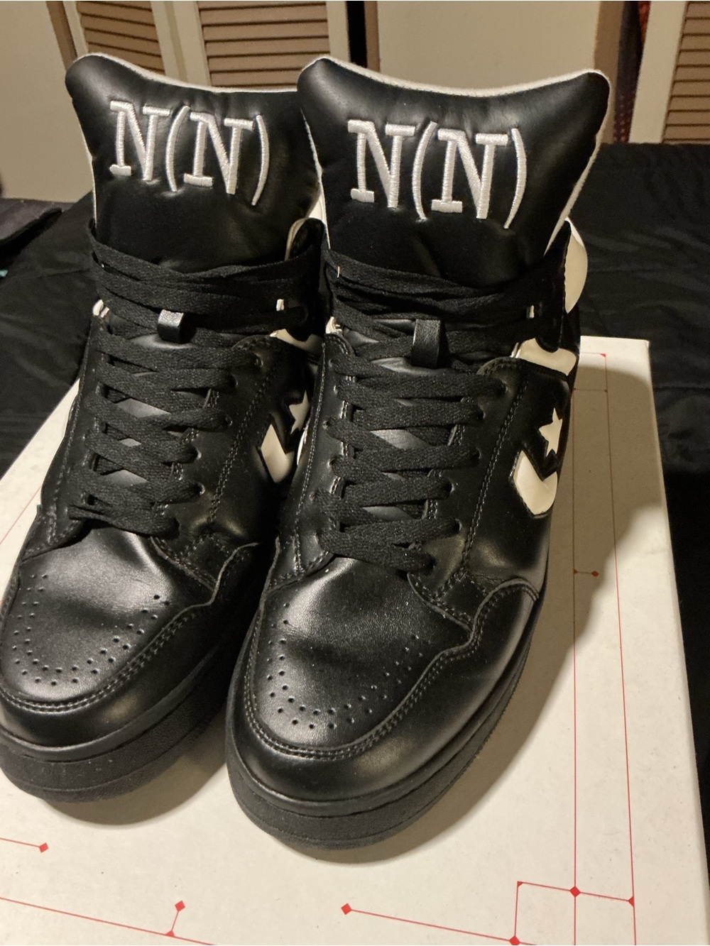 Converse Black and White High-Top Sneakers